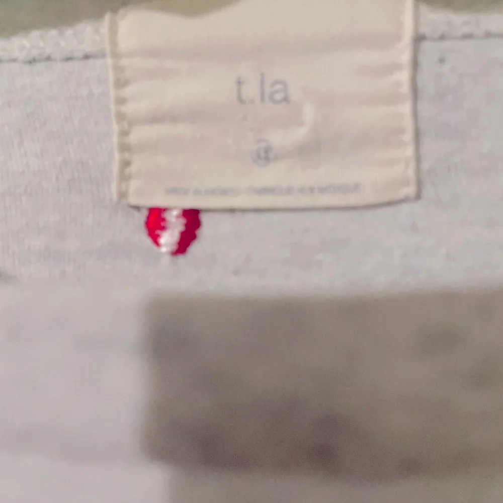 Anthropologie Flutter Sleeve Tee with multi colored embroidered Swiss Dots. - Picture 10 of 15